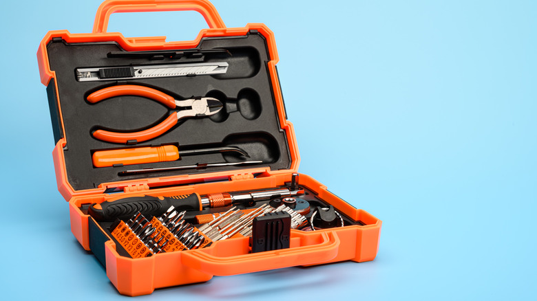 Filled toolbox on blue background