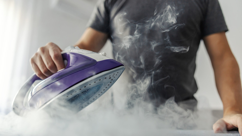 women using an iron