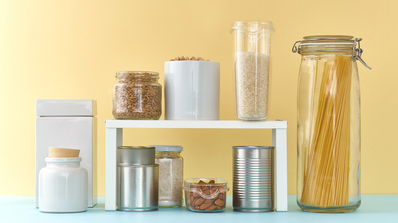 cabinet shelf with food jars