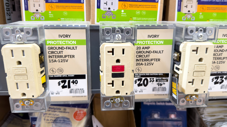 Electrical outlets in plastic are on display in a store