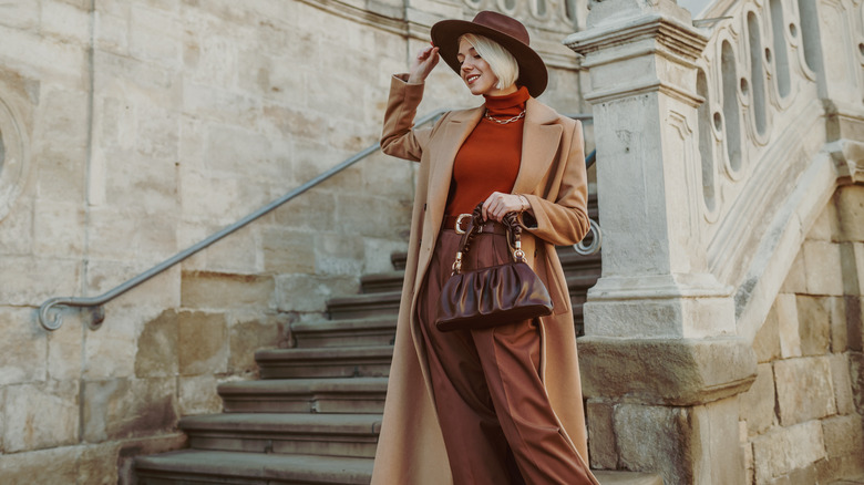 woman wearing brown cashmere coat