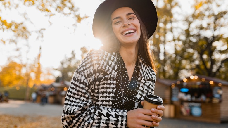 woman wearing black and white coat