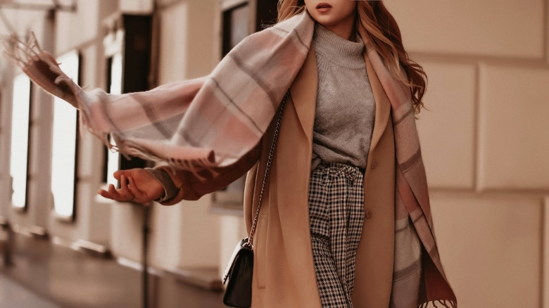 woman wearing wool coat and scarf