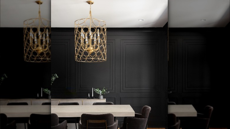 gold light fixture above table