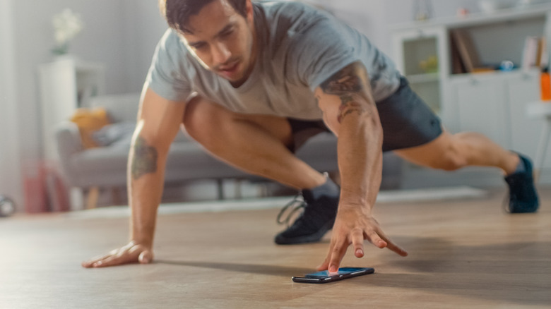 man exercises on the floor