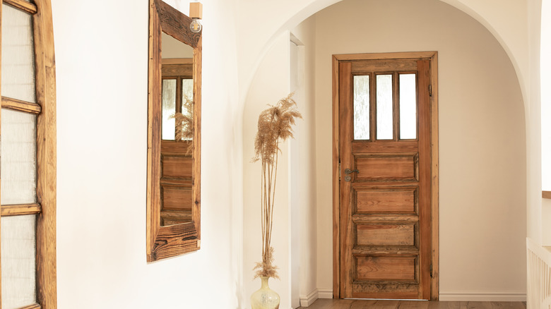 Entryway with wall mirror