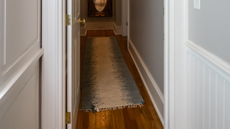 Runner in narrow hallway