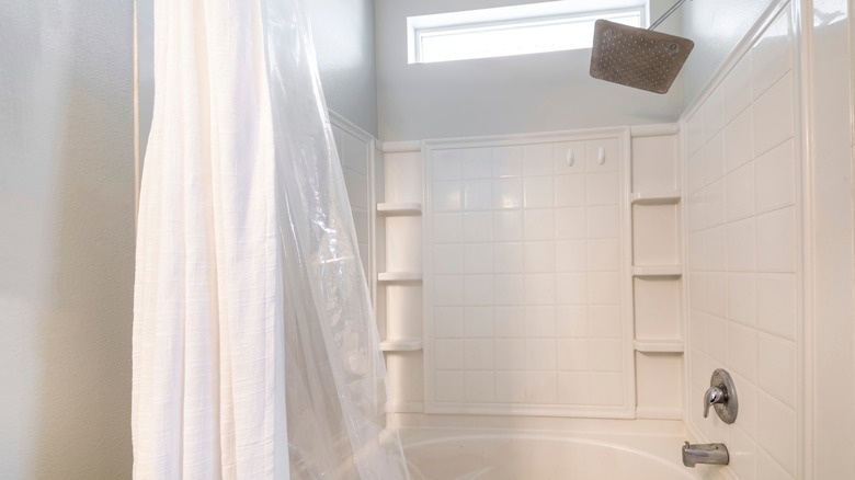 Acrylic shower with attached tub