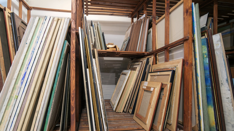 Artwork stacked in storage