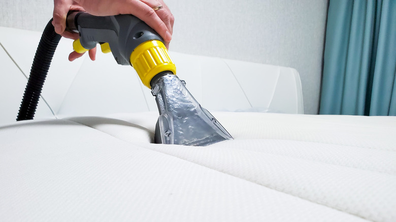 Vacuuming mattress topper