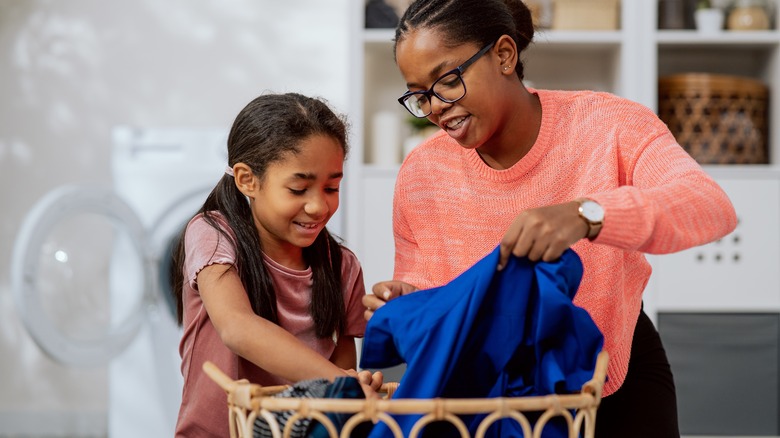 People sorting laundry 