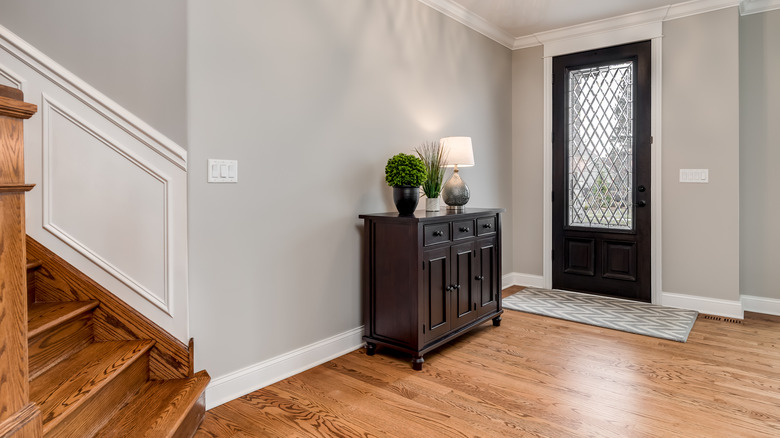 clutter free entryway black door