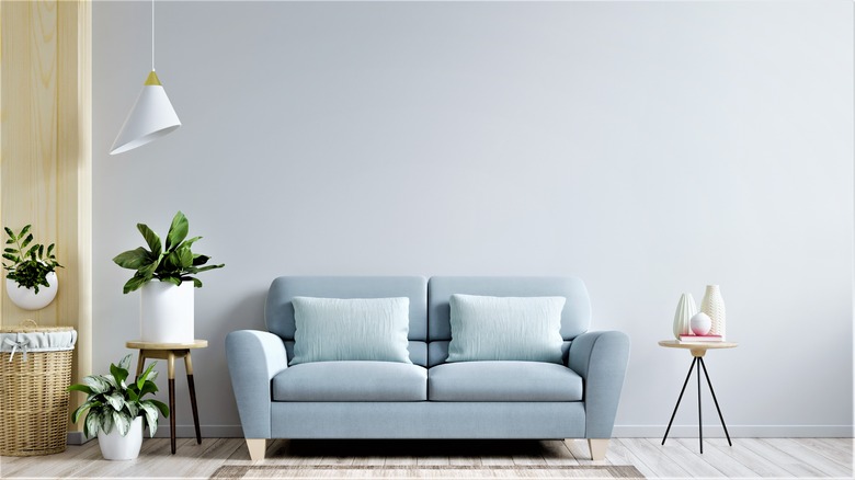 sofa against gray wall