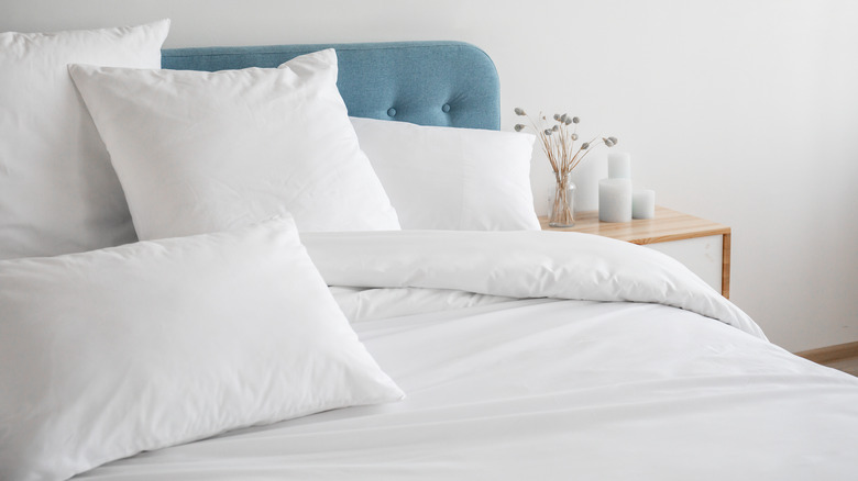 clean minimal white bedding