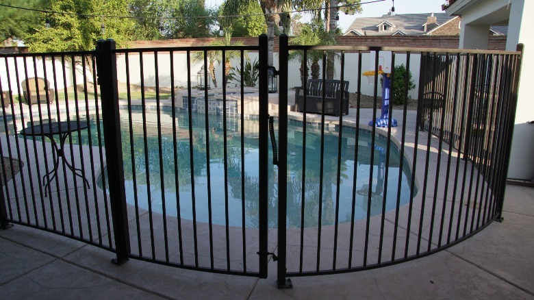 Pool with fence around it 