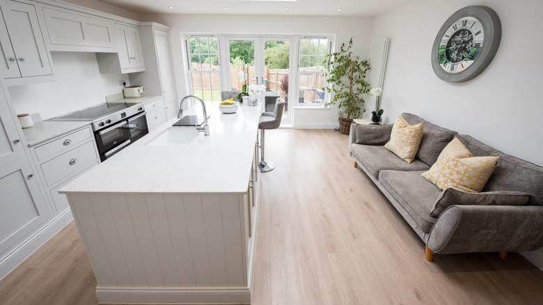 A kitchen with laminate flooring