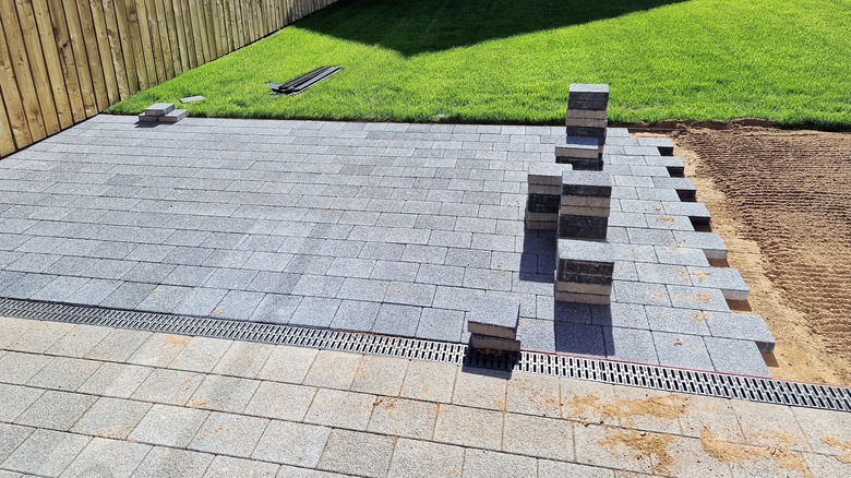 Pavers being installed in a garden