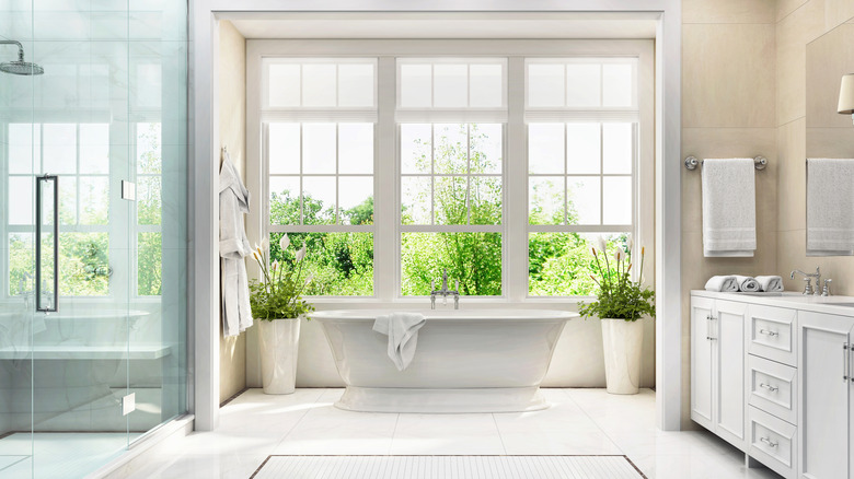 Modern bathroom with large windows