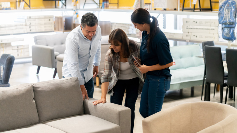 Couple shopping for a new couch