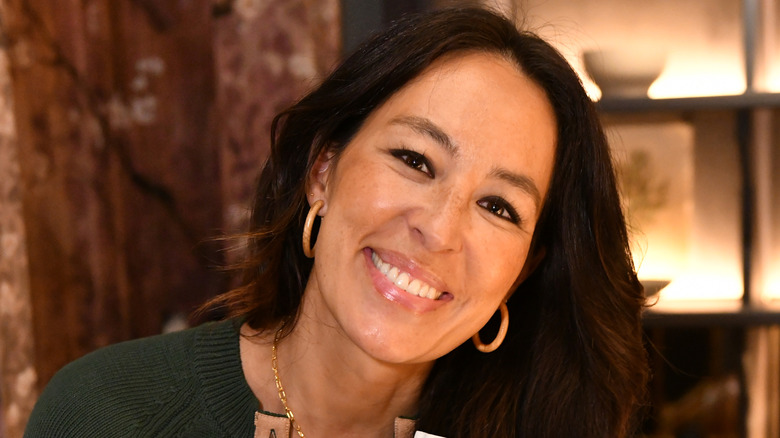 Joanna Gaines with tilted head, smiling