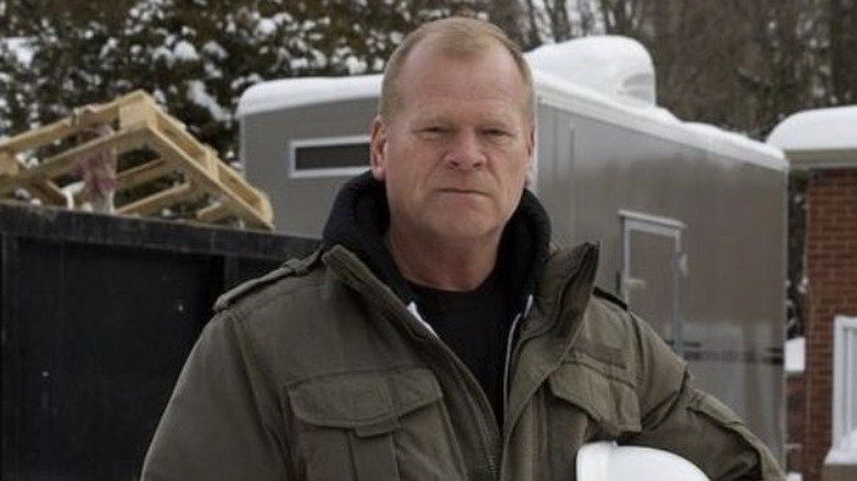 Mike Holmes sternly looking at camera