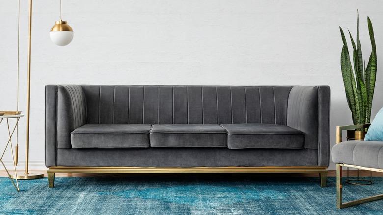 Modern gray velvet sofa