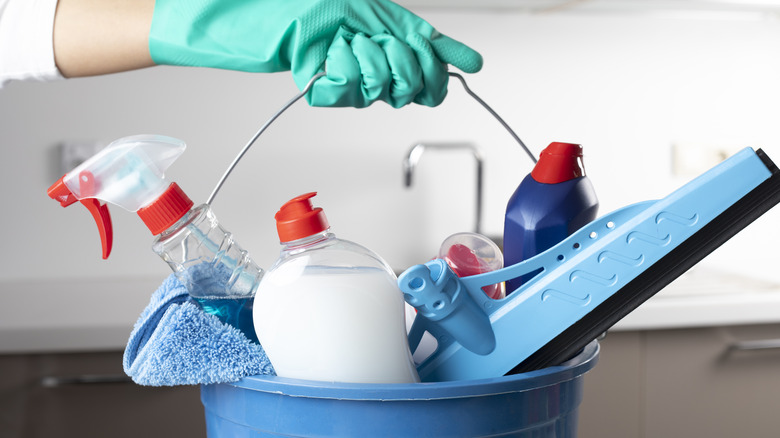 Bucket filled with chemical cleaners