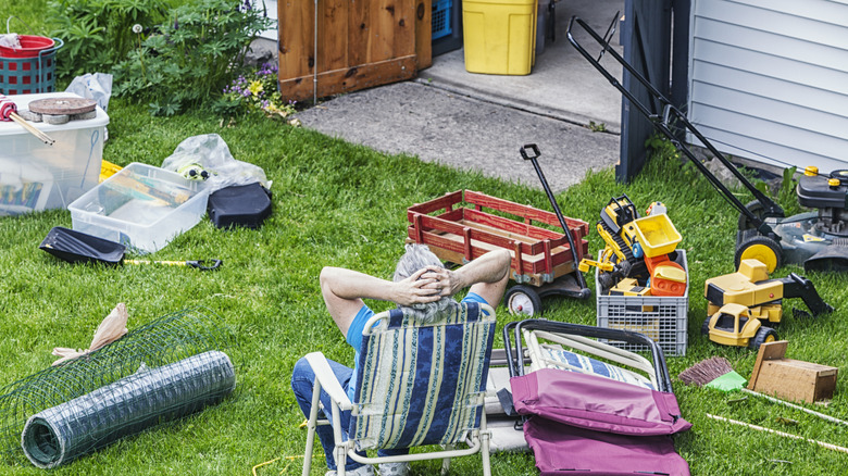 Shed items on grass in yard