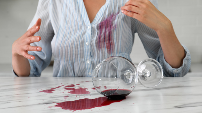 spilled glass of wine on shirt 