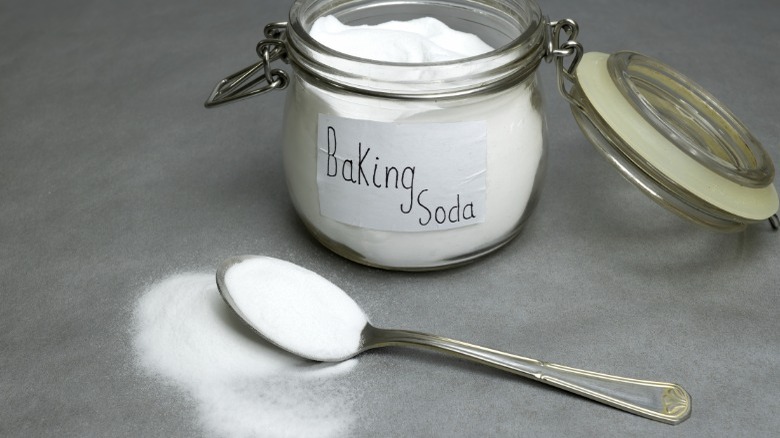 Jar of labeled baking soda and spoon