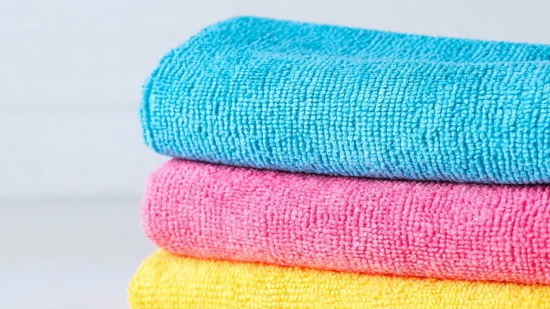 three different colored microfiber towel