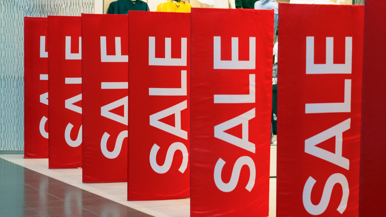 red sale signs in mall