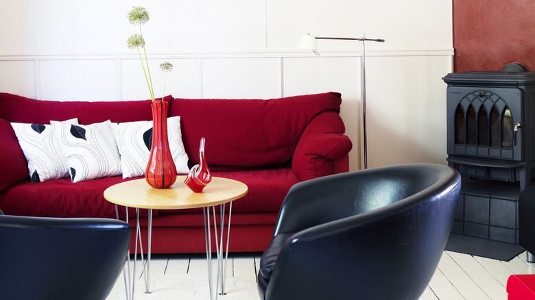 room with red furniture and decor