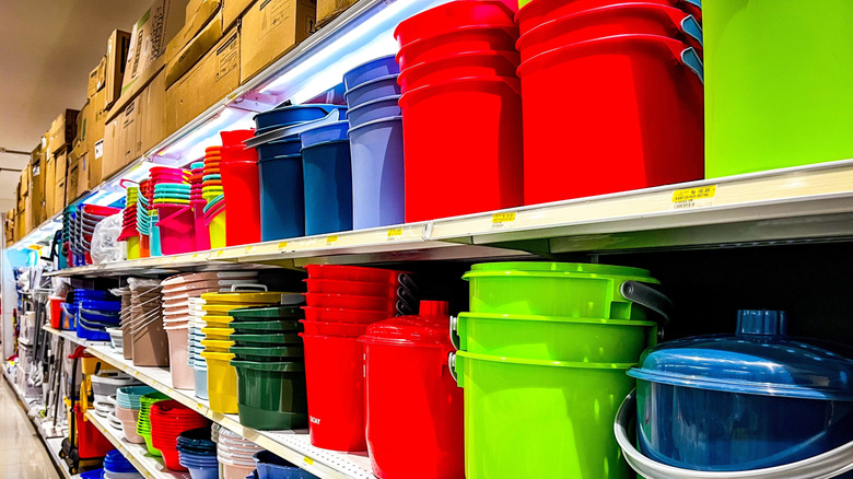 display of plastic buckets in store