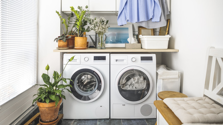 Washer and dryer in a crowded laundry space