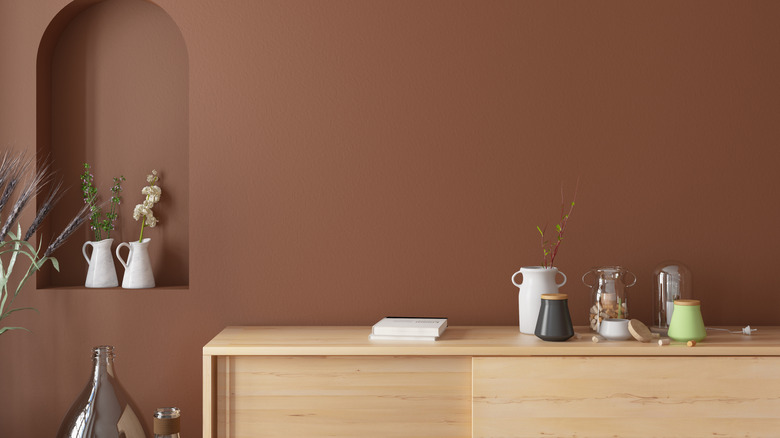 Caramel accent wall with decor