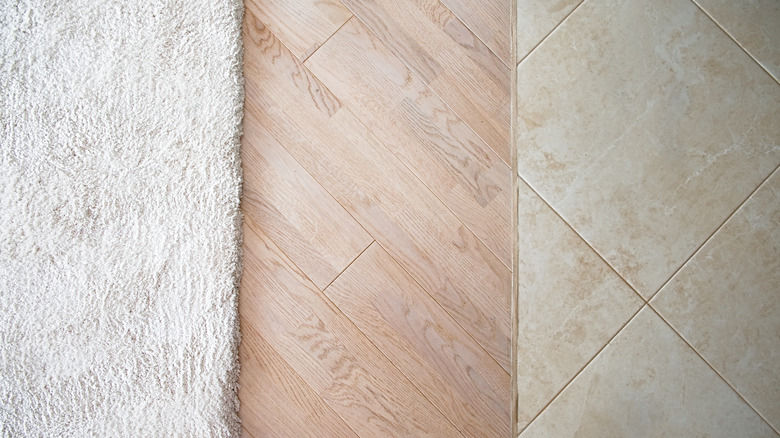 Samples of different flooring types: carpet, hardwood, and tile