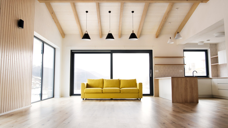 Room with beams on ceiling