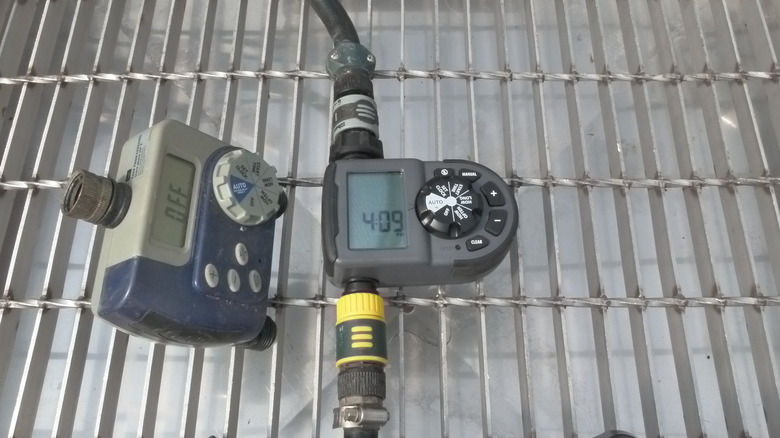 Sprinkler timer attached to hose