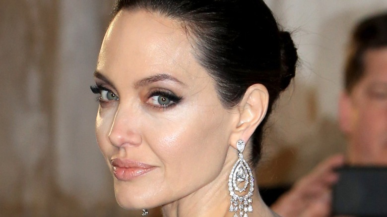 Angelina Jolie wearing earrings