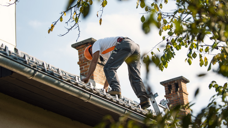 Man working on roof 