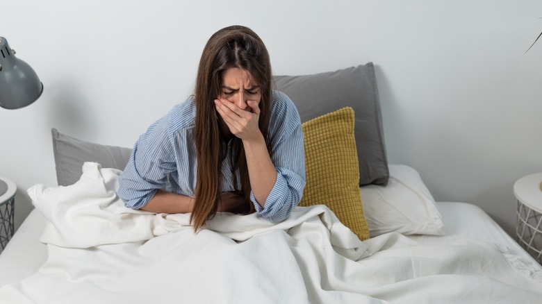 Woman feeling ill