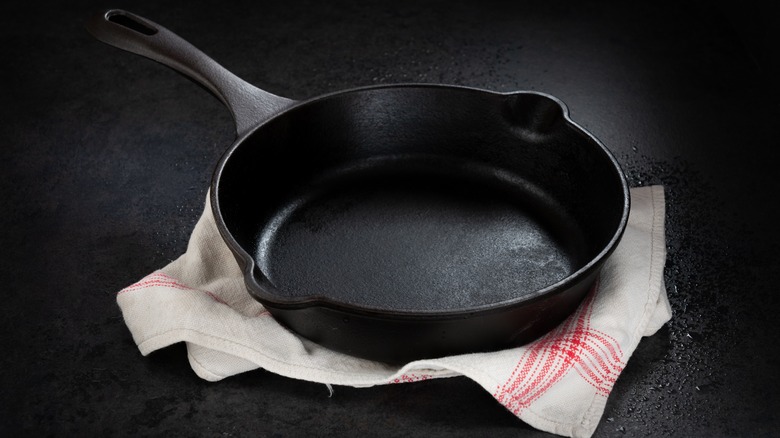 Cast iron skillet on top of cloth