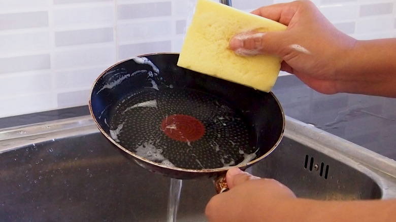 Gently washing non-stick pan