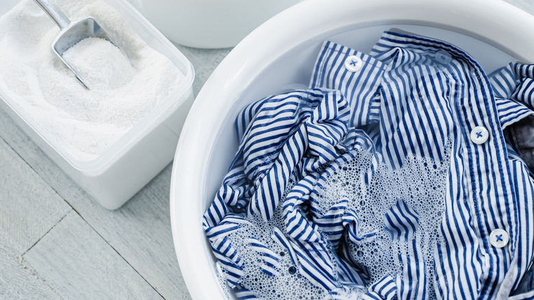 shirt in tub of water