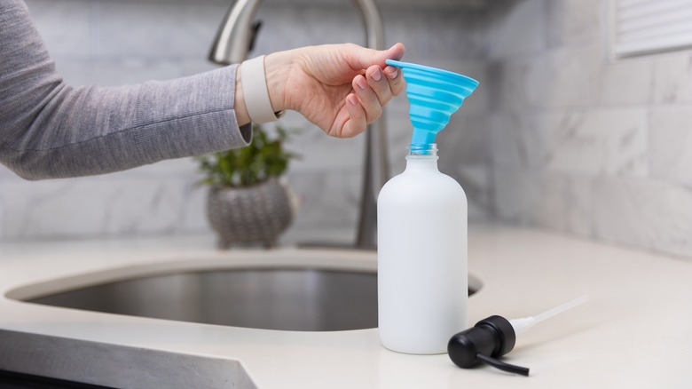 funnel on bottle for refill