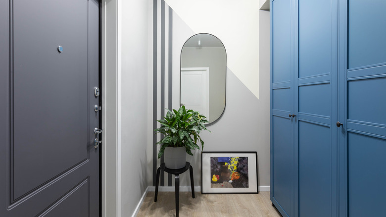 White hallway with blue accents