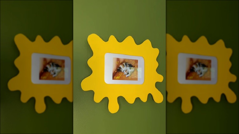 yellow digital frame on wall