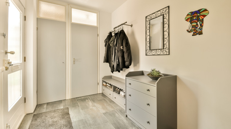 A functional entryway with the right amount of furniture and better storage area