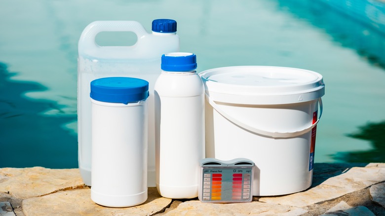 pool chemicals at the edge of the water